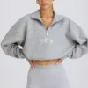 Korte sweater met kwartritssluiting in grijs gemêleerd