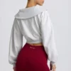 Korte sweater met kwartritssluiting in grijs gemêleerd