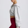 Korte sweater met kwartritssluiting in grijs gemêleerd