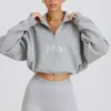 Korte sweater met kwartritssluiting in grijs gemêleerd