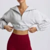 Korte sweater met kwartritssluiting in grijs gemêleerd