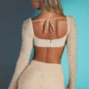 La Desirade versierde crop top met col in zandkleur