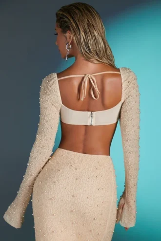 La Desirade versierde crop top met col in zandkleur