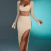 La Desirade versierde crop top met col in zandkleur