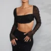 La Desirade versierde crop top met col in zwart