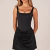 Lia minijurk met vetersluiting en drapering in zwart