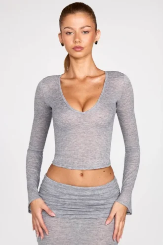 Liah doorschijnende jersey top met lange mouwen en diep decolleté in grijs