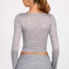 Liah doorschijnende jersey top met lange mouwen en diep decolleté in grijs