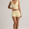 Lisha Modal geribbelde mid-rise Shorts met omgeslagen zoom in botergeel
