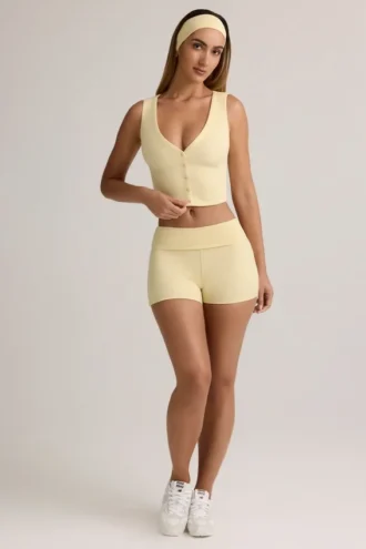 Lisha Modal geribbelde mid-rise Shorts met omgeslagen zoom in botergeel