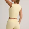 Lisha Modal geribbelde mid-rise Shorts met omgeslagen zoom in botergeel