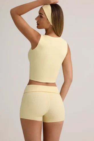 Lisha Modal geribbelde mid-rise Shorts met omgeslagen zoom in botergeel