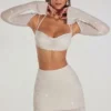 Lucerne versierde crop top met lange mouwen in ivoor
