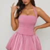 Ludmila halternek micro-minijurk met vetersluiting en bolle zoom in mauve