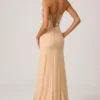 Lysana versierde korsetjurk met vissenstaart in bloemig beige