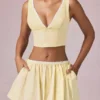 Magda crop top met strikdetail in citroengeel gestreept