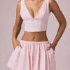 Magda crop top met strikdetail in zacht mauve gestreept