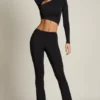 Mairead asymmetrische gedrapeerde flared broek met middelhoge taille in zwart