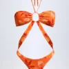 Maranta halternekbadpak met uitsnijdingen in oranje orchideeënprint