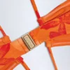 Maranta halternekbadpak met uitsnijdingen in oranje orchideeënprint