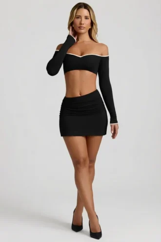 Mari Modal mini-rok met asymmetrische taille in zwart