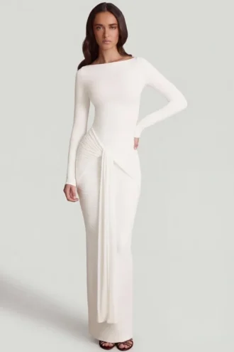 Mericia Maxijurk van zachte jersey met boothals en strikdetails in wit