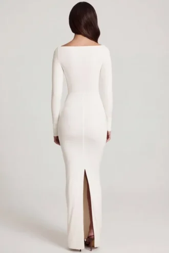 Mericia Maxijurk van zachte jersey met boothals en strikdetails in wit