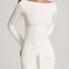 Mericia Maxijurk van zachte jersey met boothals en strikdetails in wit