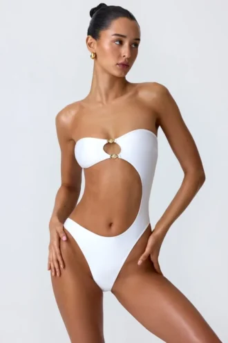 Miami bandeau-badpak met cut-outs en kralenversiering in wit