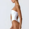 Miami bandeau-badpak met cut-outs en kralenversiering in wit