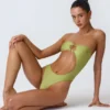 Miami bandeau-badpak met uitsnijdingen en kralenversiering in perengroen
