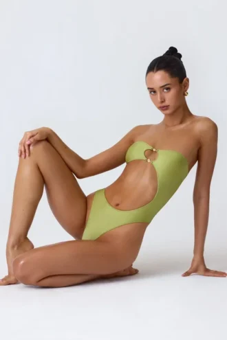 Miami bandeau-badpak met uitsnijdingen en kralenversiering in perengroen