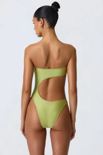 Miami bandeau-badpak met uitsnijdingen en kralenversiering in perengroen