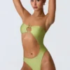 Miami bandeau-badpak met uitsnijdingen en kralenversiering in perengroen