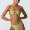Miami bandeau-badpak met uitsnijdingen en kralenversiering in perengroen