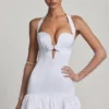 Millie minijurk met strikdetail, halternek en bolle zoom in wit