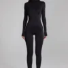 Musa jumpsuit met hoge hals en lange mouwen in zwart