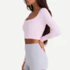 Naadloze, zacht geribde crop top met uitsnijdingen in poederroze