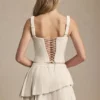 Nada gelaagde geplooide minirok met lage taille in ivoor