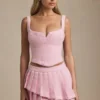 Nada gelaagde geplooide minirok met lage taille in zachtroze