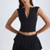 Nada gelaagde geplooide minirok met lage taille in zwart