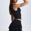 Nada gelaagde geplooide minirok met lage taille in zwart