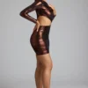 Nasira minijurk van metallic jersey met uitsnijdingen in koperbrons