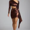 Nasira minijurk van metallic jersey met uitsnijdingen in koperbrons