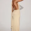 Navina zachte jersey maxi-jurk met diepe halslijn en halternek in champagne