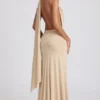 Navina zachte jersey maxi-jurk met diepe halslijn en halternek in champagne