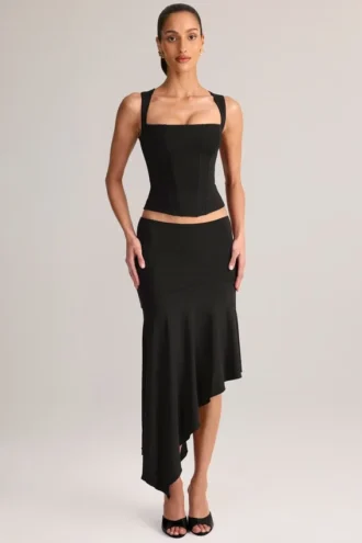 Niva modale asymmetrische midi-rok met lage taille in zwart