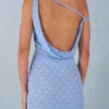 Nivara maxi-jurk met één schouder in blauw met stippenprint