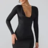 Oakley Slinky Jersey minijurk met lange mouwen en diep decolleté in zwart