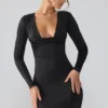 Oakley Slinky Jersey minijurk met lange mouwen en diep decolleté in zwart